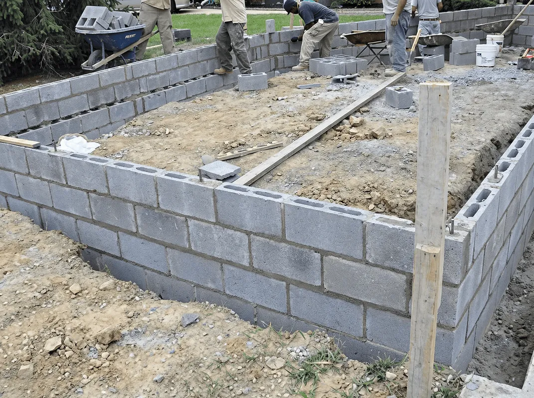 Professionals building a foundation with blocks in Fresno, CA