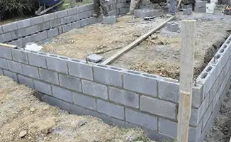 Professionals building a foundation with blocks in Fresno, CA