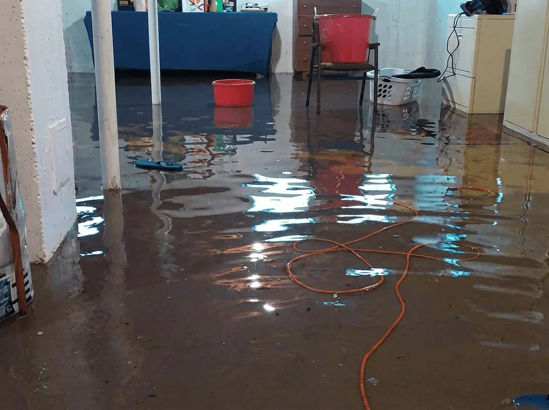 Basement with boiler, cabinets and washing machine completely flooded in Fresno, CA