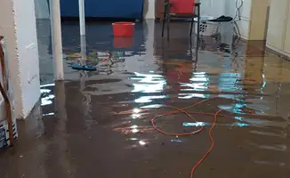 Basement with boiler, cabinets and washing machine completely flooded in Fresno, CA
